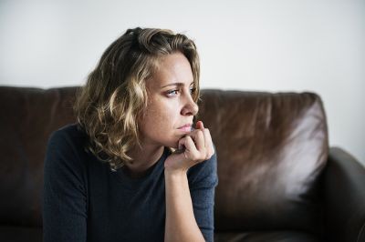 serious-woman-looking-outside